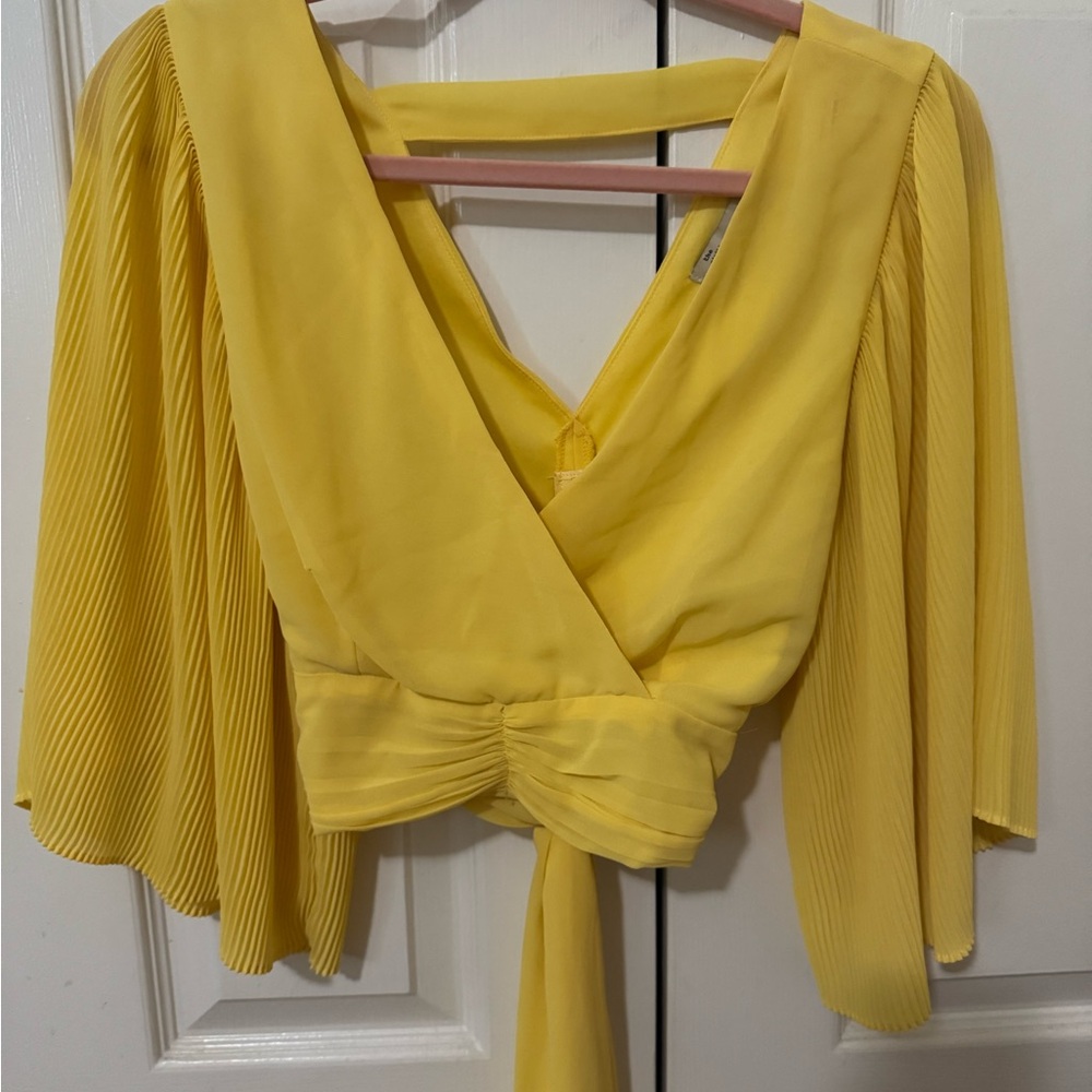Boutique yellow wrap top with flowy sleeves